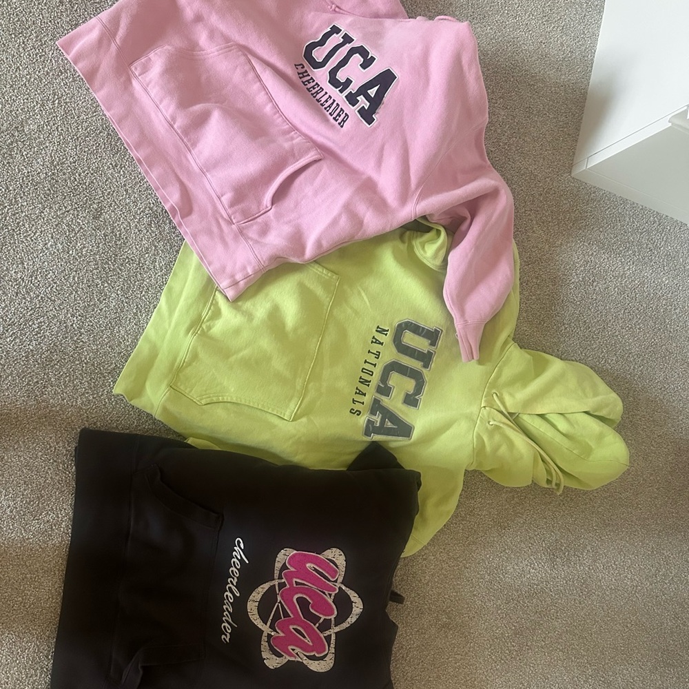 UCA Hoodies in Pink, Yellow, and Black